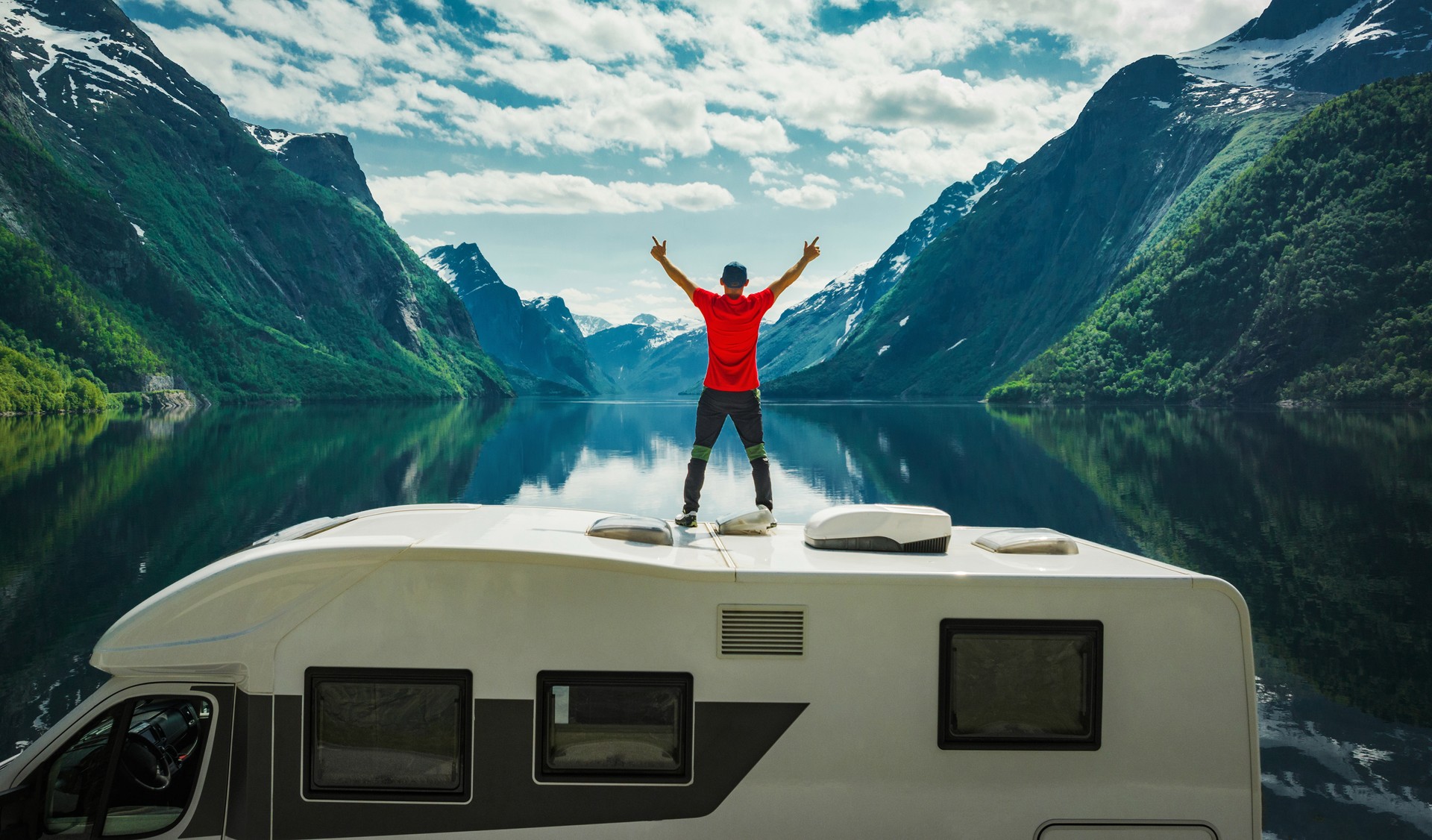 Man Expressing His Happiness Seeing Perfect Norwegian Landscape